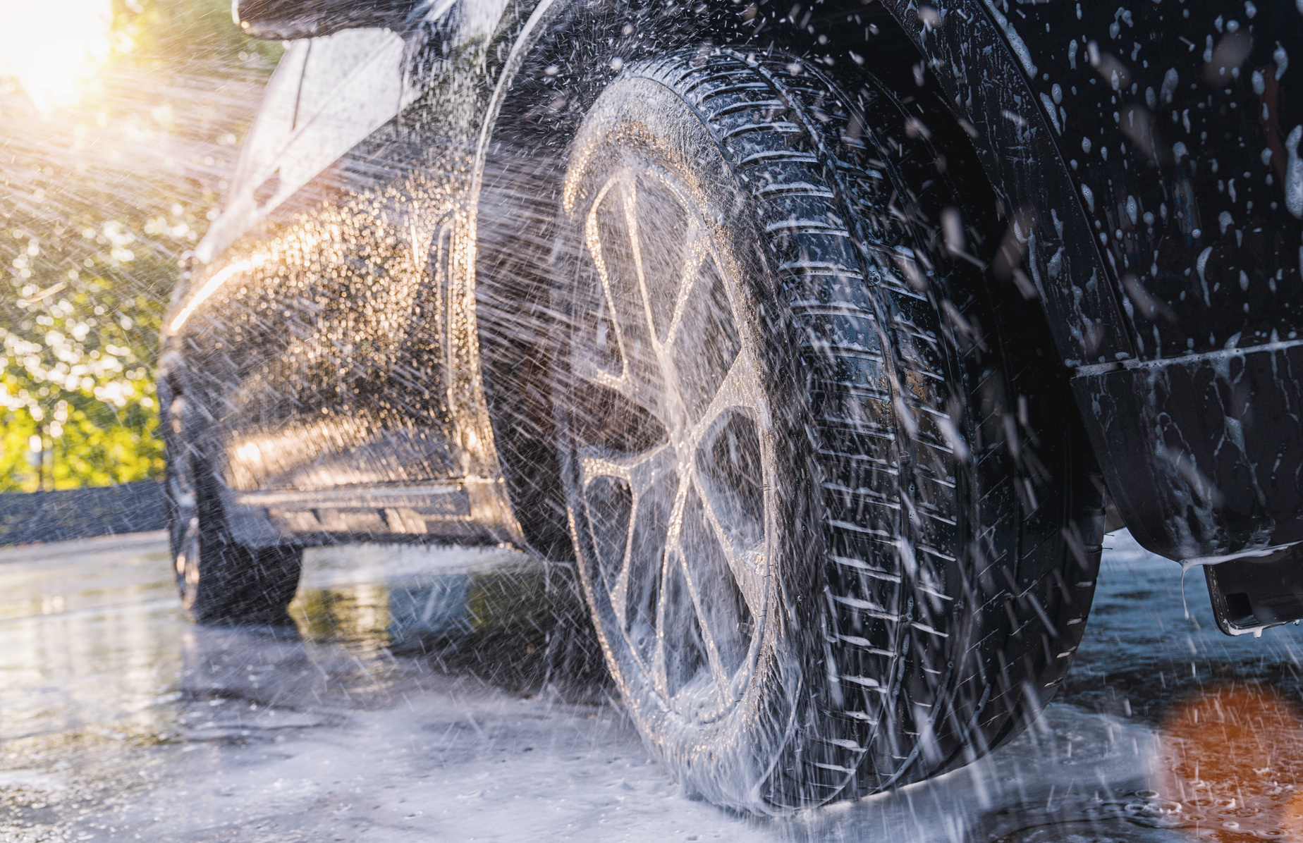 Washing SUV Car with Soap. Close up Car Wash Concept.